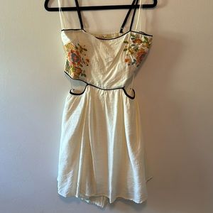 Summer Dress with embroidered floral detailing and side cut outs